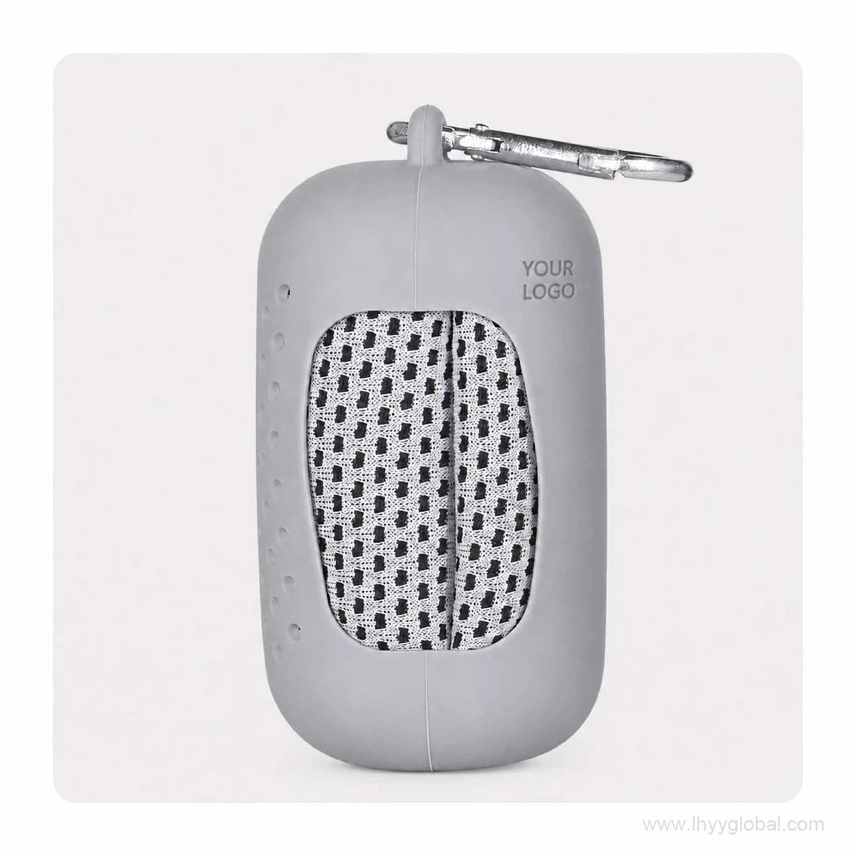 Light gray cooling towel folded inside a silicone capsule case with carabiner