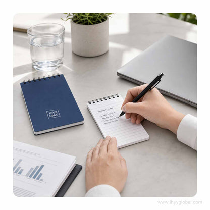 Custom logo pocket spiral notebook used for research notes at a laboratory or office desk.