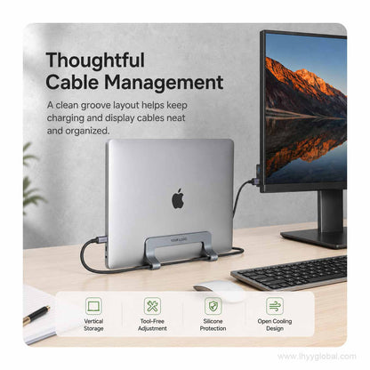 Custom logo vertical laptop stand on a desk with charging and display cables routed around the base