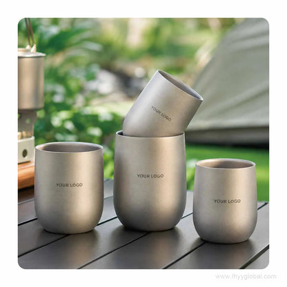 Custom logo pure titanium double-wall cup set showing multiple sizes and stackable design