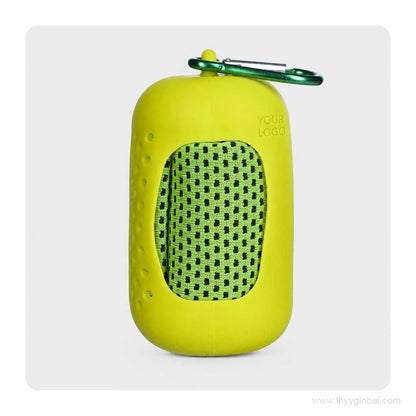 Lime green cooling towel in a matching silicone capsule case with carabiner