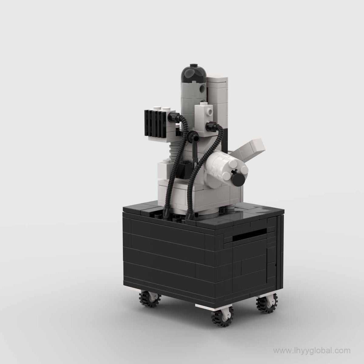 Rear view of the Axia ChemiSEM building block model showing gray instrument details, black tubing and cabinet base