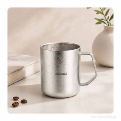 430 mL custom logo pure titanium double-wall mug in silver finish on a desk