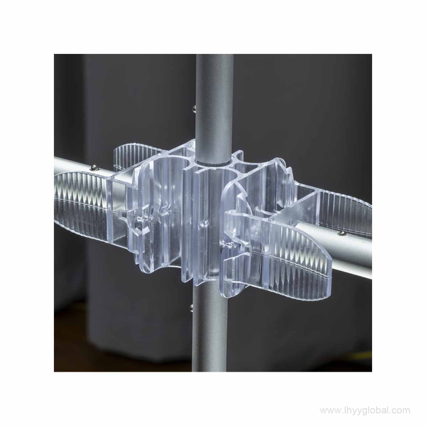 Close-up rendering of a quick-lock connector joining the SEG lightbox aluminum frame sections.