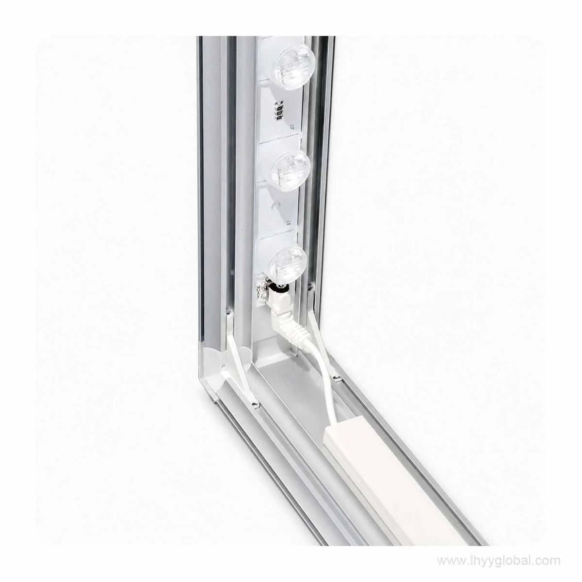 Close-up of LED light modules and power connection inside the free-standing SEG lightbox frame