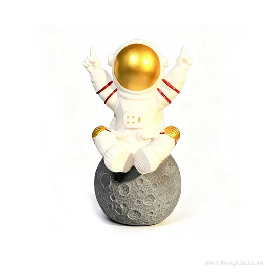 Astronaut Bluetooth speaker with moon base design and gold visor for space themed gifts