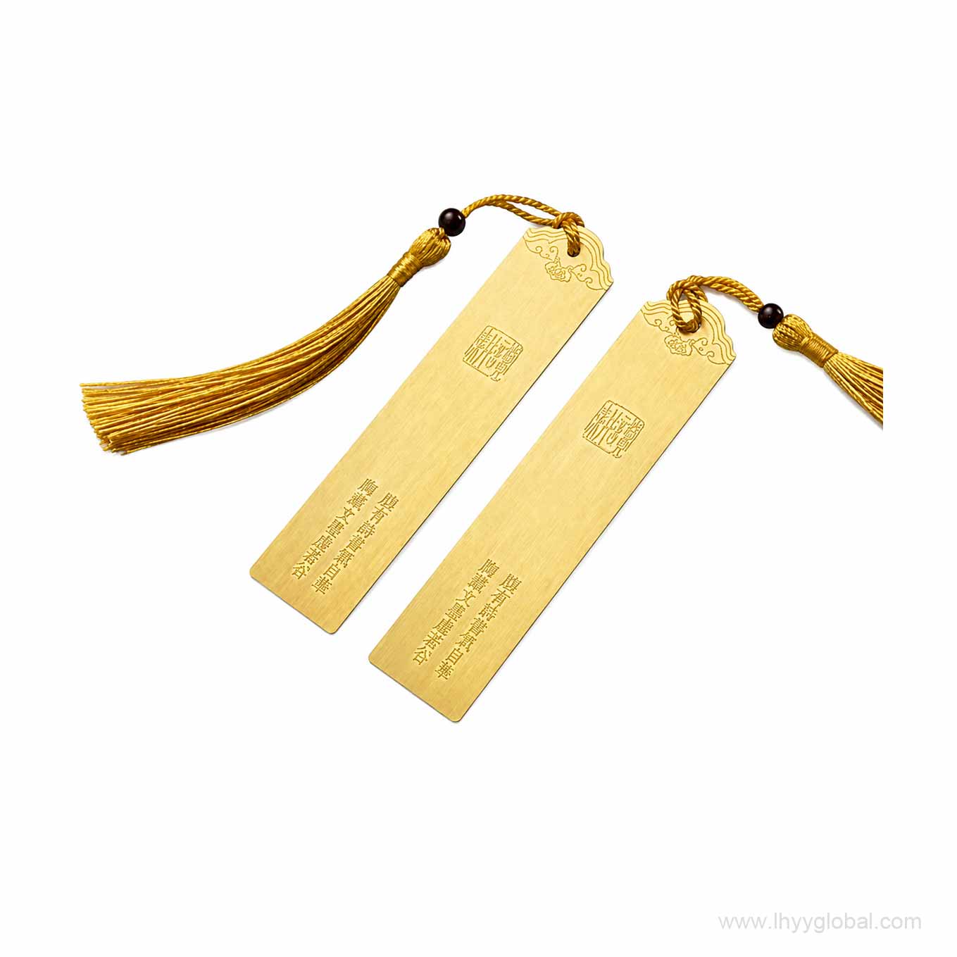 Brass bookmark with decorative tassel detail for corporate gift set