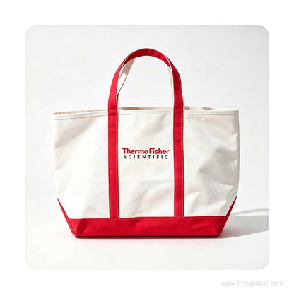 White canvas tote bag with red dual handles and printed corporate logo