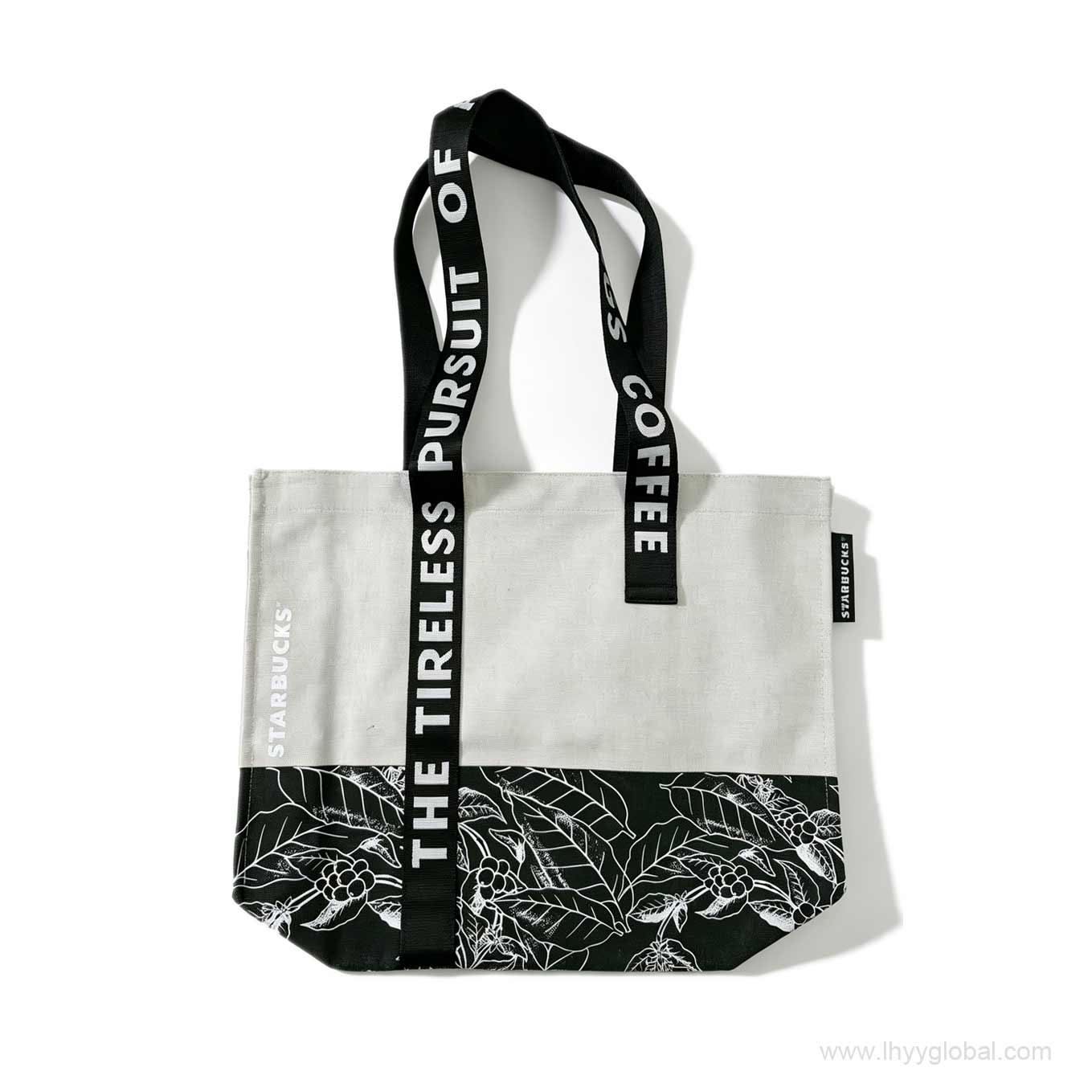 Reference image of a custom corporate tote bag with white canvas and black splicing, woven strap printing, and side label, similar to previous Starbucks corporate branding projects.