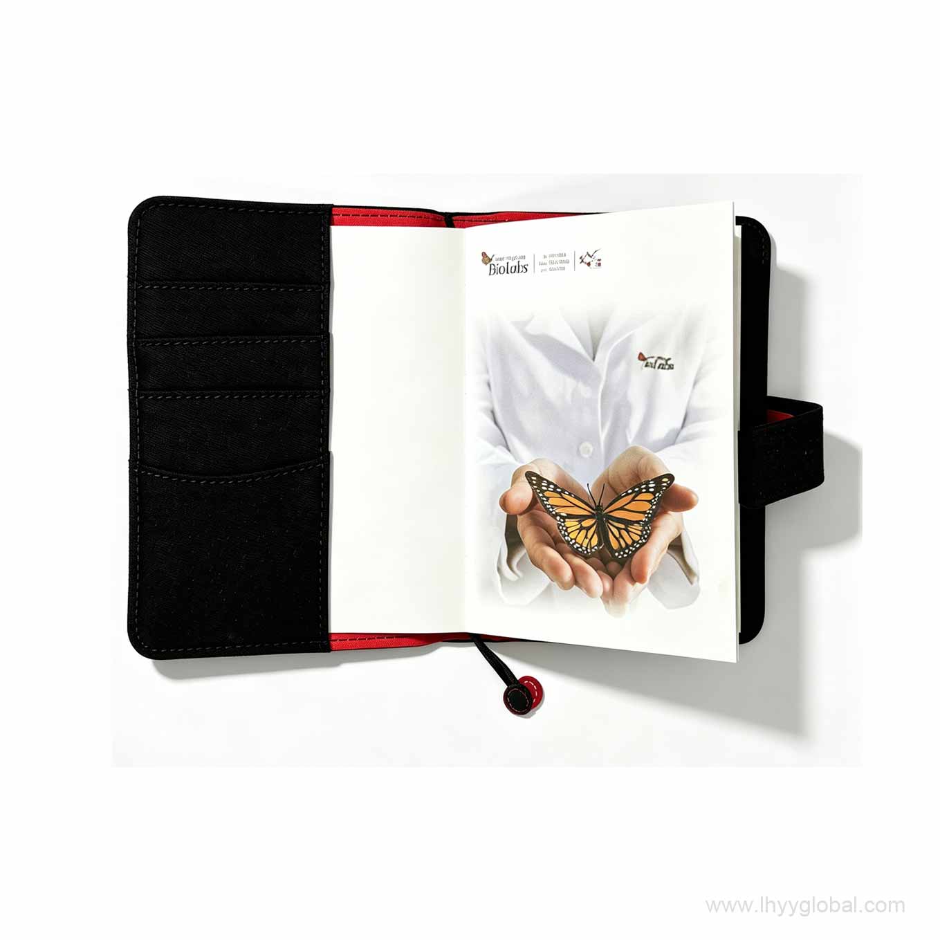 Interior view of a custom corporate notebook featuring multiple card slots, red inner binding, and a bespoke branded NEB bio-labs insert page.