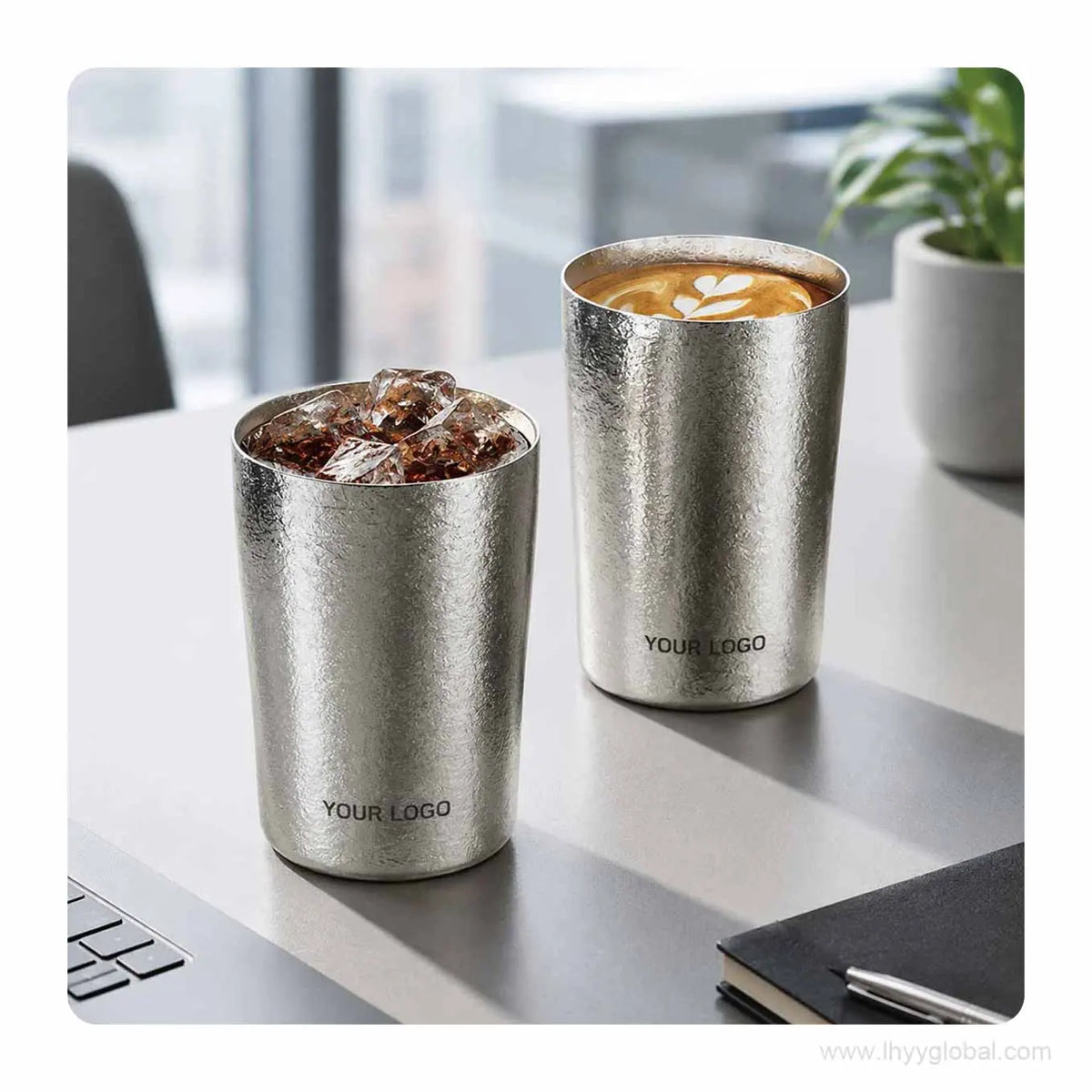 Two custom logo pure titanium cups shown with iced and hot beverages on an office table