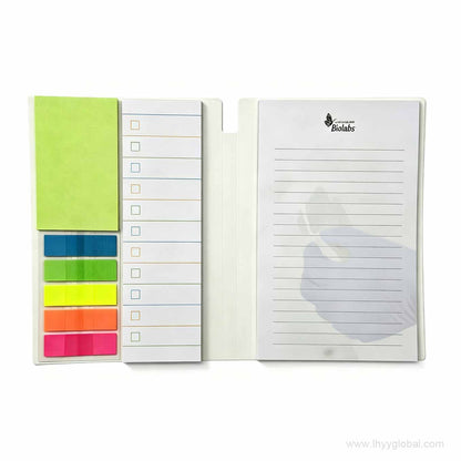 Open custom sticky note notebook showing colorful index flags and multiple memo pad formats