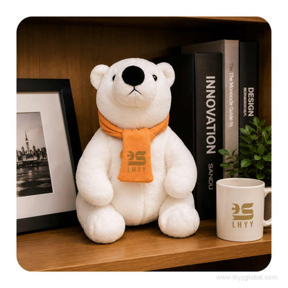 Custom polar bear plush toy with logo scarf displayed on a modern office shelf
