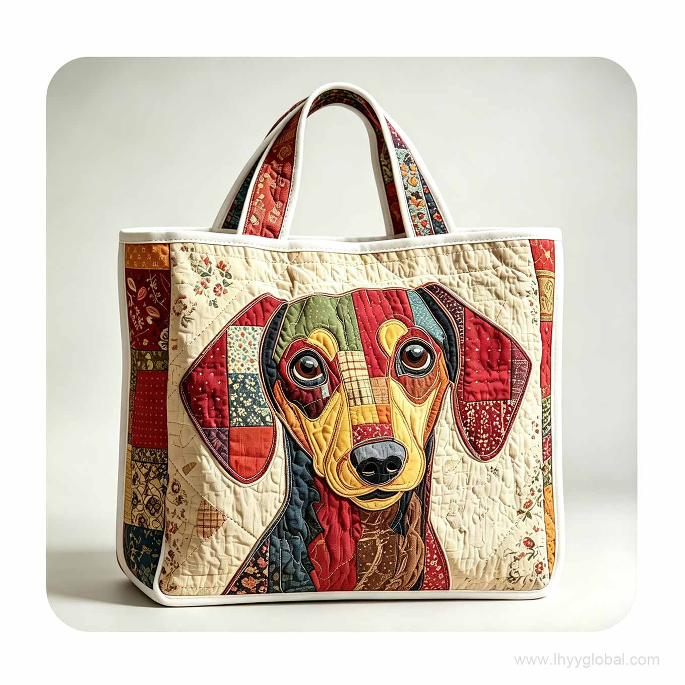 Custom quilted appliqué tote bag with multicolor portrait artwork and dual handles