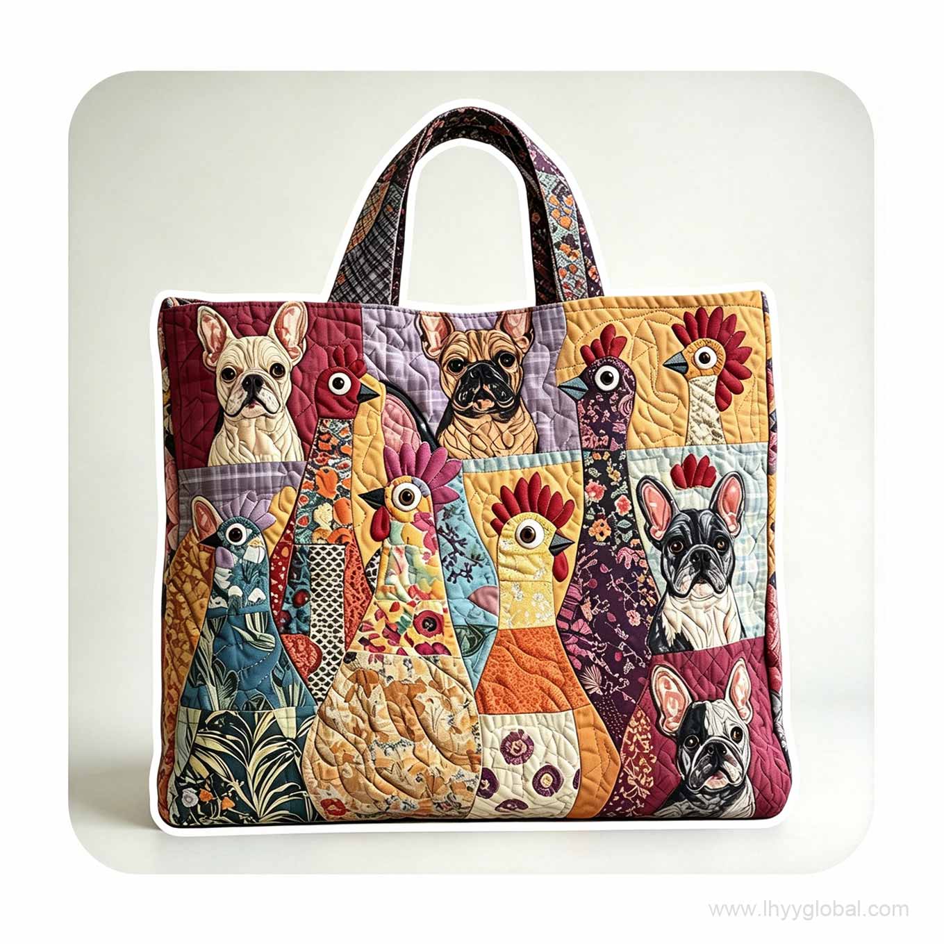 Front view of a custom quilted tote bag with black handles and multicolor textile artwork