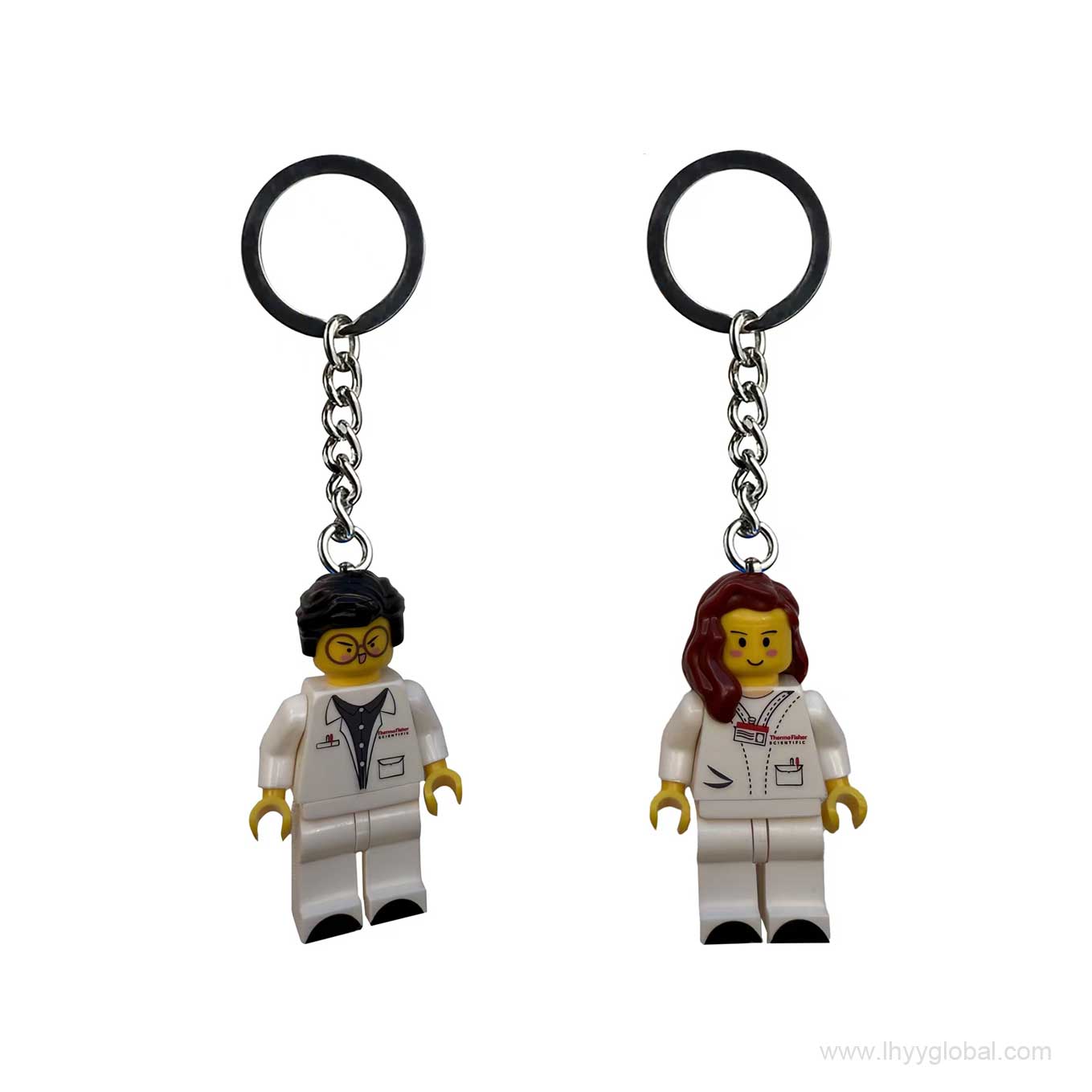 Custom female scientist minifigure keychain with red hair and detailed lab coat print, perfect for life science promotional events.