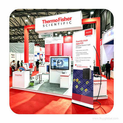 Multiple custom fabric L-banner stands arranged as a trade show booth backdrop