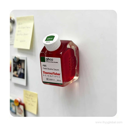 Thermo Fisher Gibco fridge magnet on a fridge with sticky notes, a must-have science gift for cell culture researchers.