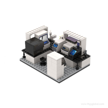 Close-up view of a building block model of a QuantStudio qPCR and Ion Torrent sequencer as part of a miniature laboratory diorama.