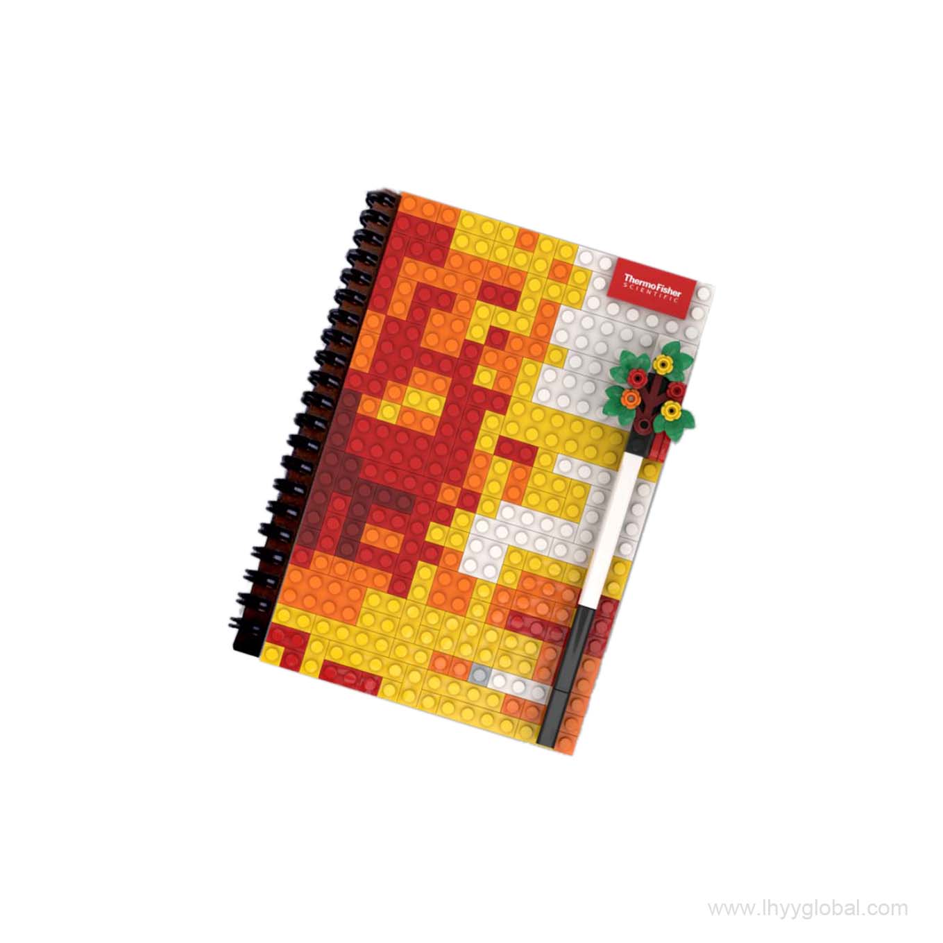 Custom Lego-compatible Brick Notebook with a red-themed Tree Pen and warm-toned building block cover.