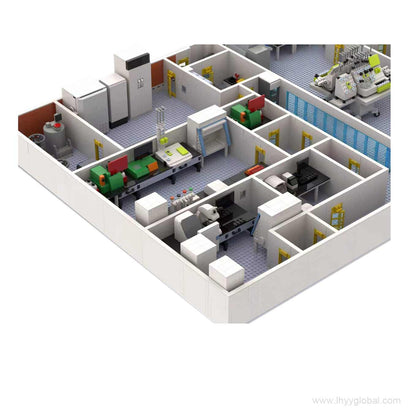 A close-up view of a custom Miltenyi Biotec laboratory station made from building blocks, highlighting the branded equipment, computer monitors, and modular shelving.