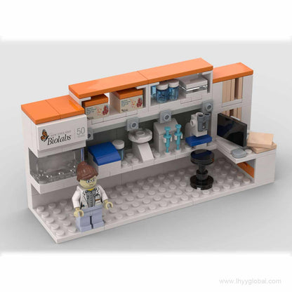 Custom Lego-compatible molecular biology lab bench model with pipettes and tube racks