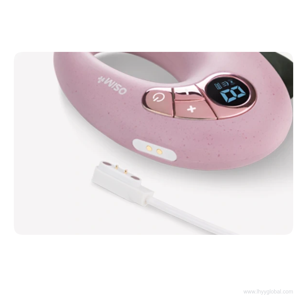 OSIM uGlow Guasha charging contacts next to the white two-pin magnetic cable connector.