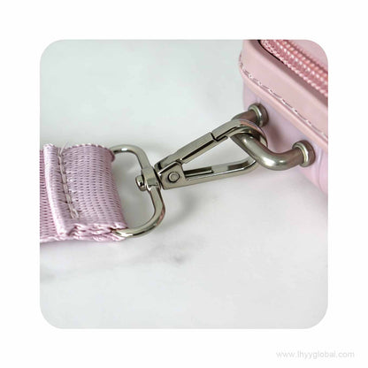 Close-up of high-quality metal swivel snap hook and adjustable strap on a premium PP hard shell mini case for corporate branding.
