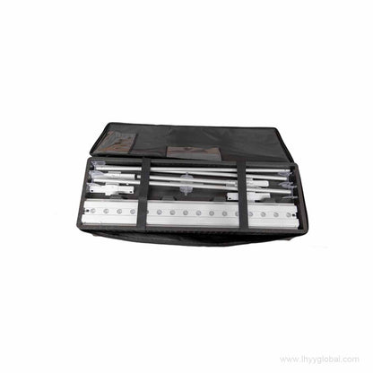 Open travel case showing the organized interior compartment with securing straps, designed to safely store the dismantled SEG lightbox aluminum profiles and connectors.