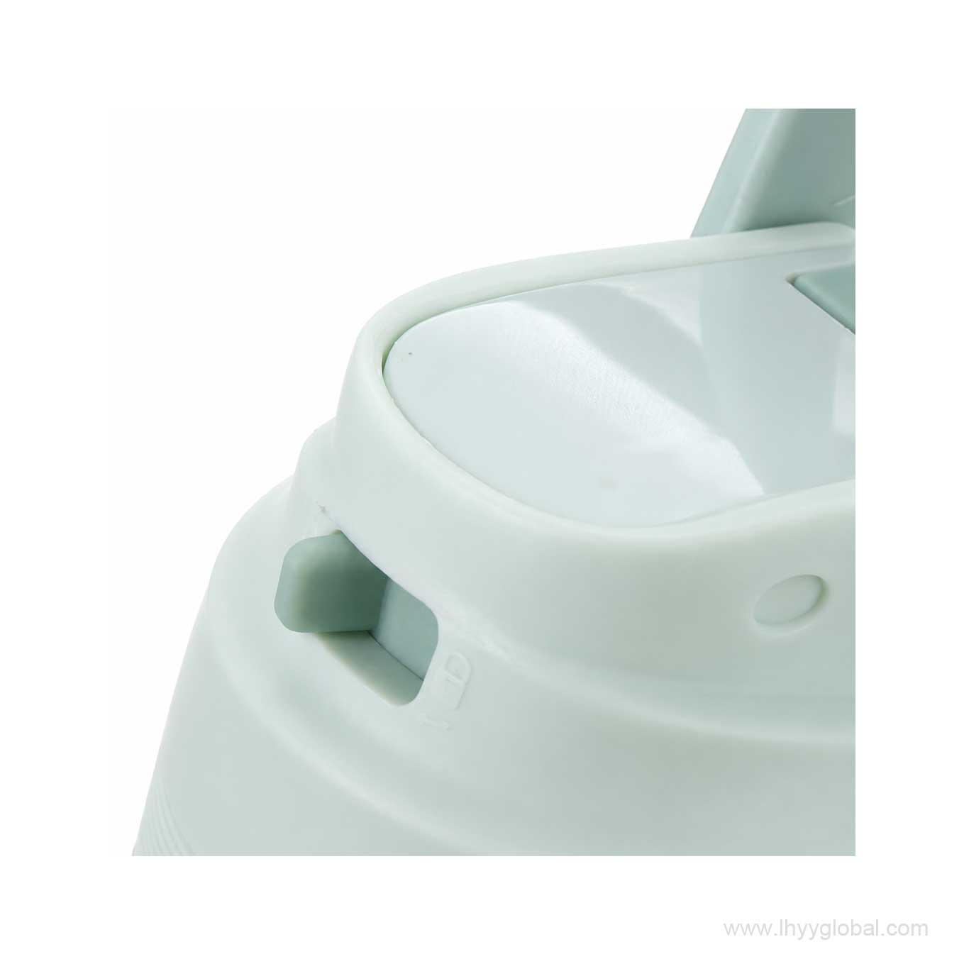 Sliding lock control on the lid of Starbucks mint green sports bottle